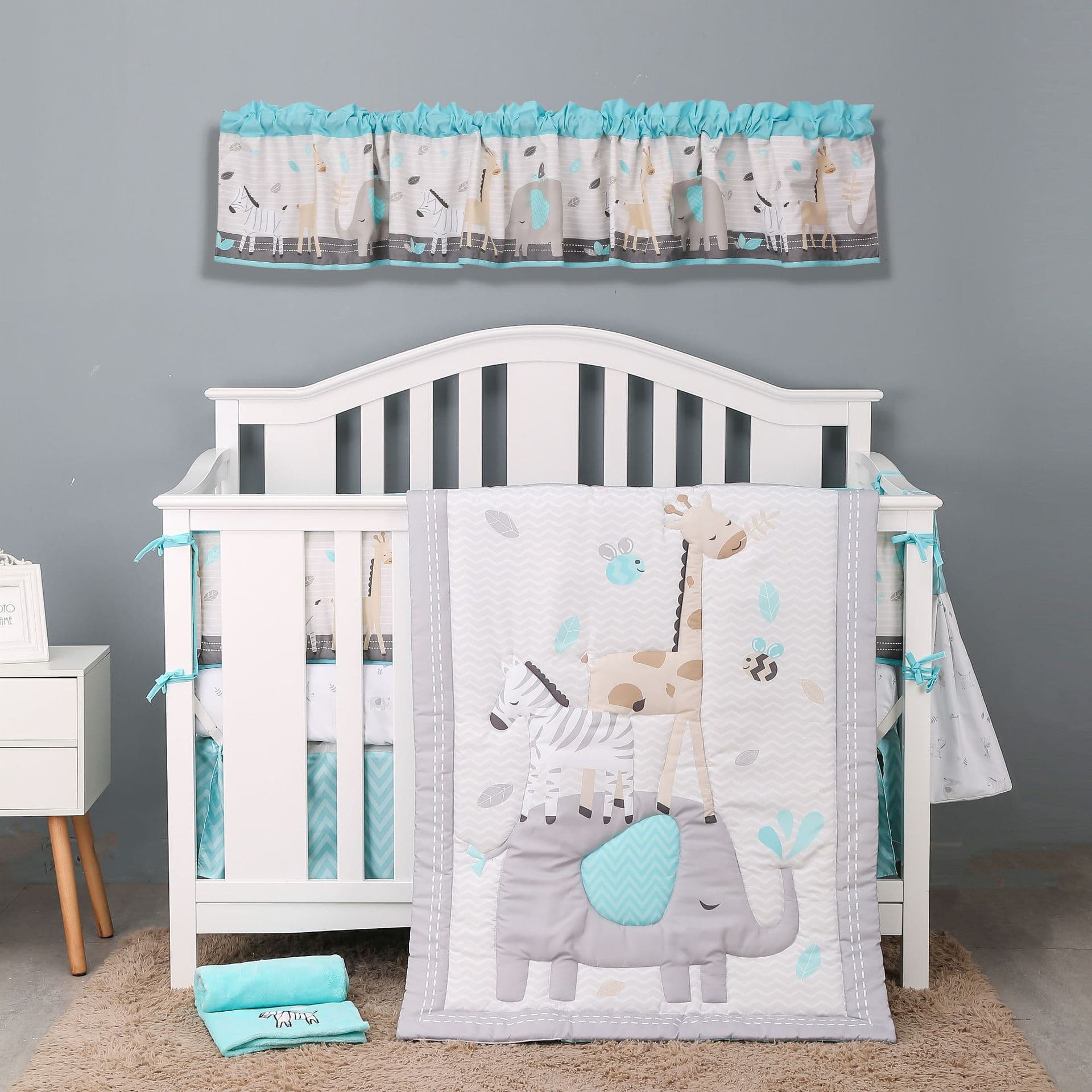 Newborn baby bedding set, including blankets, crib bumpers, fitted sheets, bed skirts, diaper bags, curtains, and more.