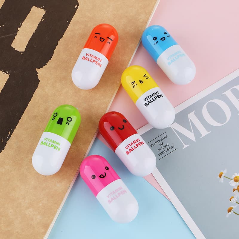 Cute pill-shaped ballpoint pen, student stationery, cartoon emoji retractable pen, Taobao free gift capsule pen, advertising pen
