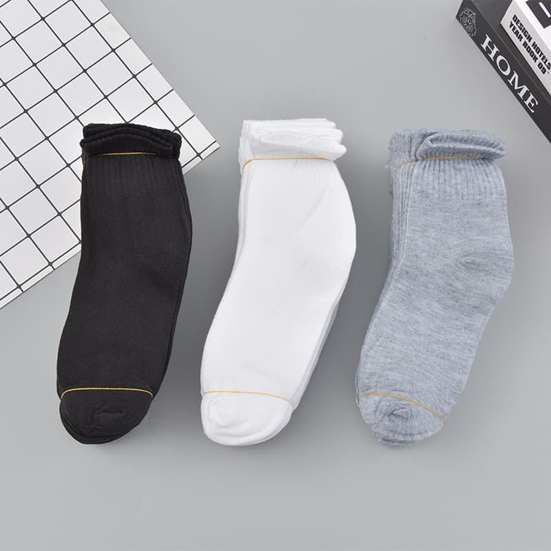 Autumn and winter men's black, white, and gray socks, solid color polyester-cotton men's mid-calf socks, street vendor socks, wholesale.