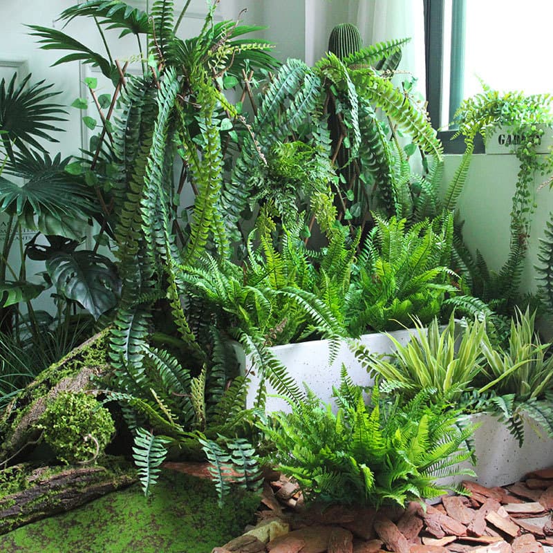 Artificial fern leaves, artificial flowers, green foliage, floral materials, and woodland landscaping decorations