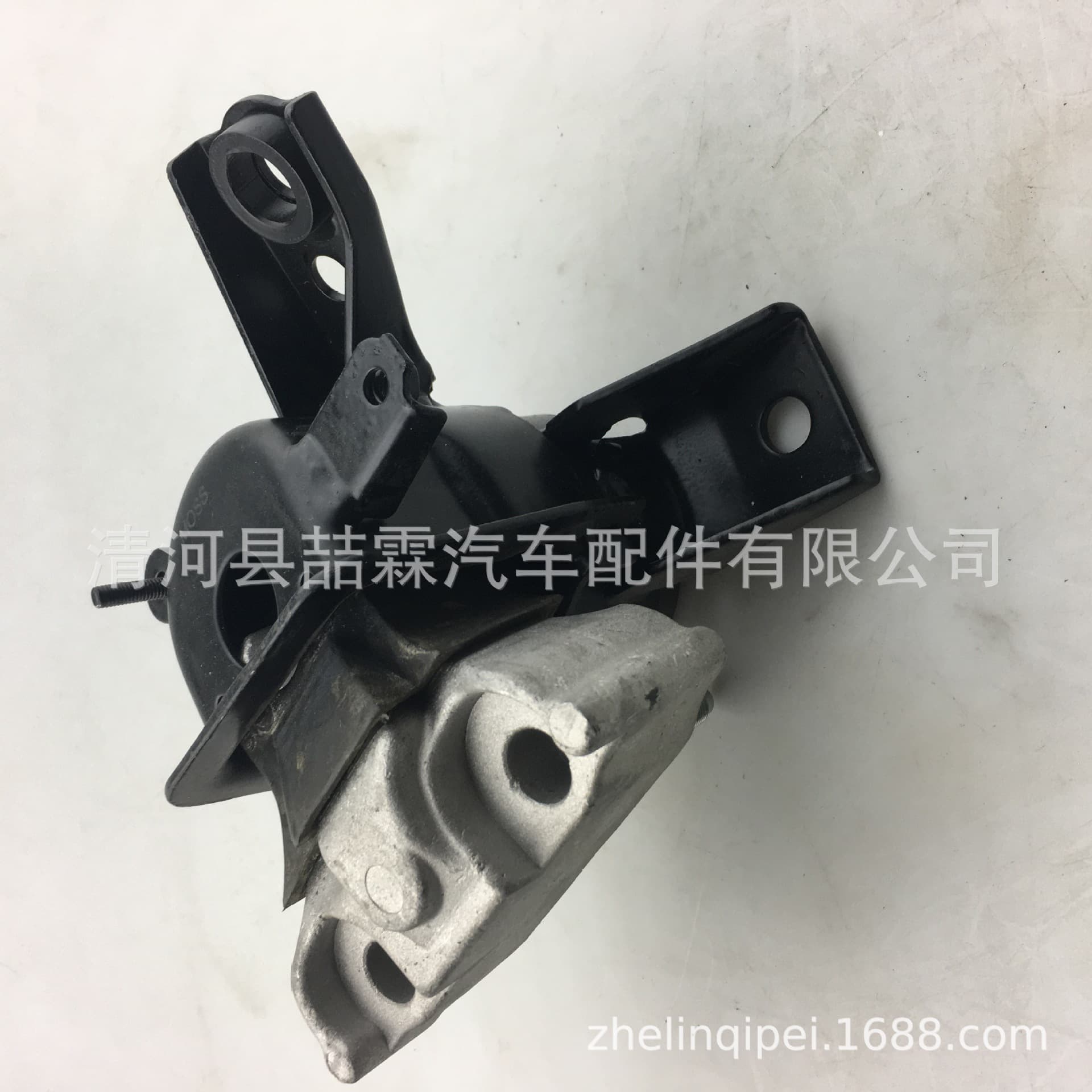 Production and processing of Toyota engine mount 12305-28230.