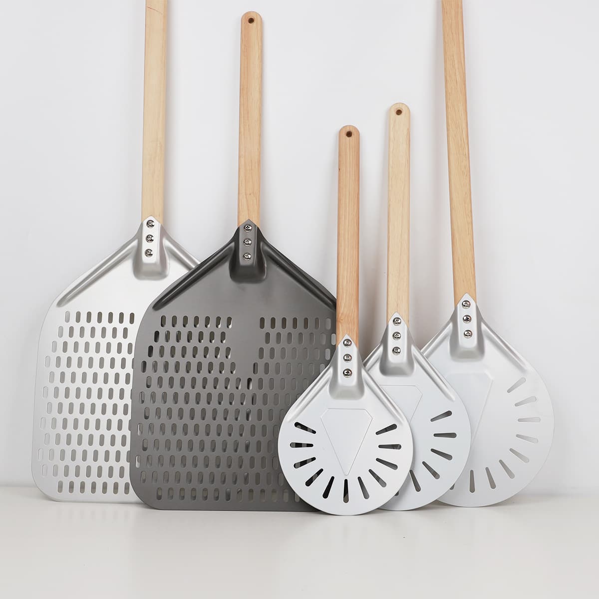 Export Home Use Pizza Peel Wood Handle 7-inch 8-inch 9-inch Aluminum Alloy Thick Anodized Hard Film Perforated Pizza Peel