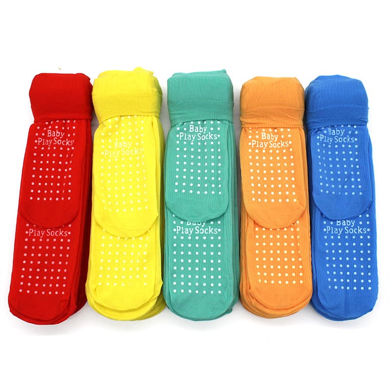 Hot-selling children's non-slip mid-calf socks, suitable for adults, playgrounds, indoor trampoline parks, and other amusement parks. Logo-printed adhesive socks.