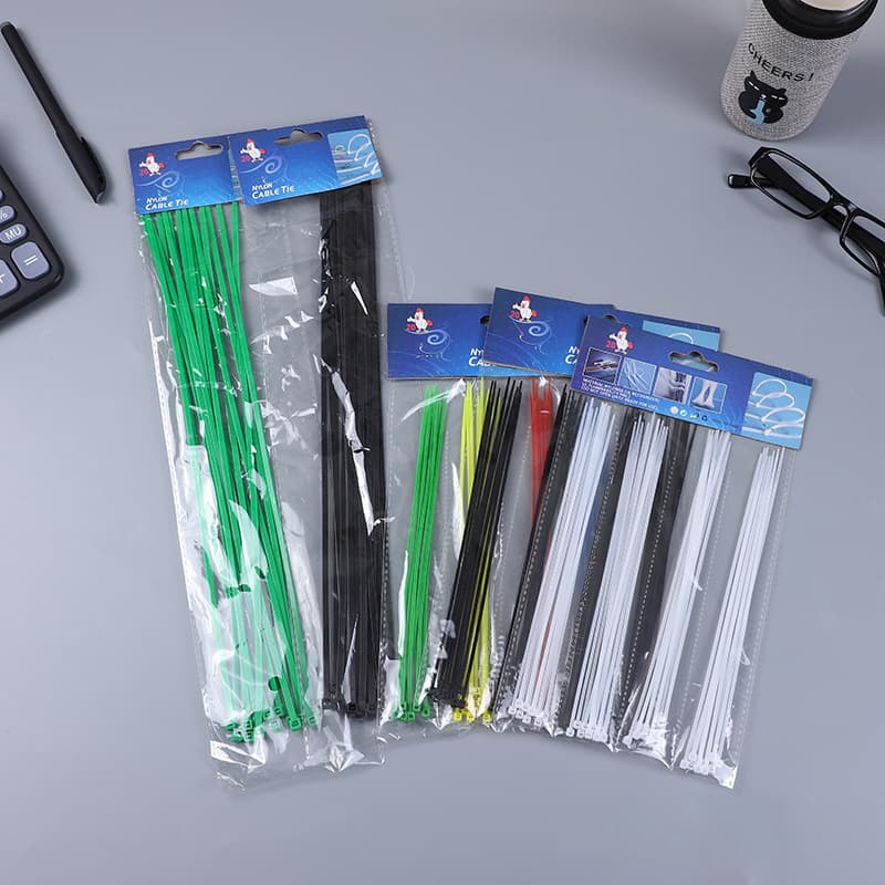 Bagged self-locking nylon mini small disposable plastic cable ties for wire harnessing.