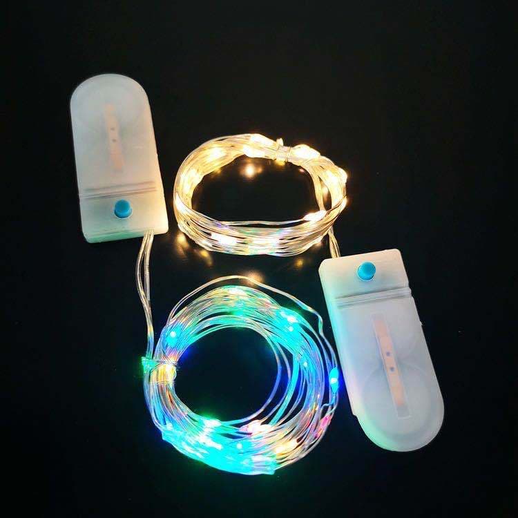 Multifunctional string lights with flashing lights for flowers, cakes, colorful gift boxes, stars, batteries, copper wire, and LEDs.
