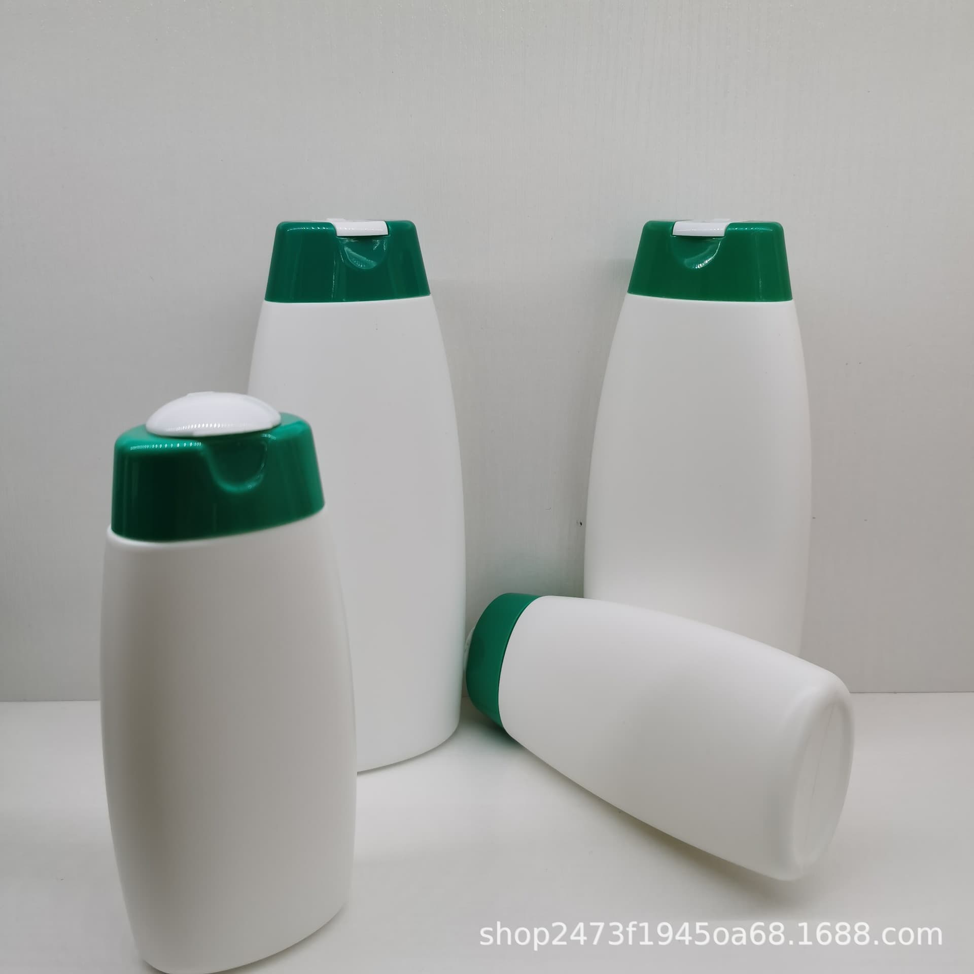 Direct factory wholesale PE plastic 200ML, 400ML shampoo and shower gel uniquely shaped flat bottles + dual-color flip caps.