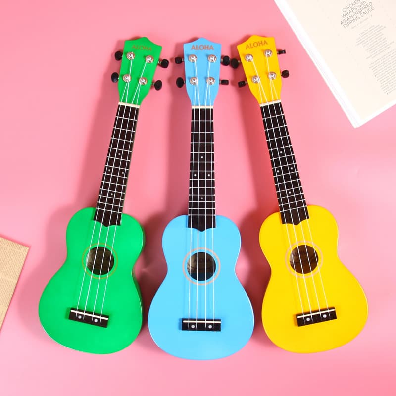 ALOHA 21-inch basswood ukulele ukulele playable musical instrument small guitar factory wholesale logo sticker