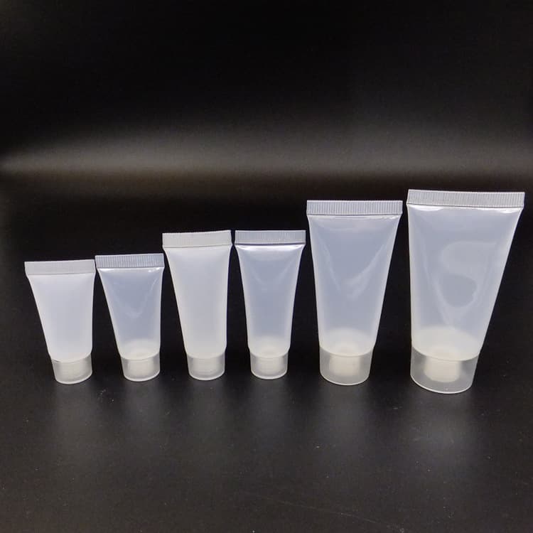 Transparent PE plastic cosmetic tube bottle stock screw cap/flip cap shampoo sample refill squeeze packaging bottle