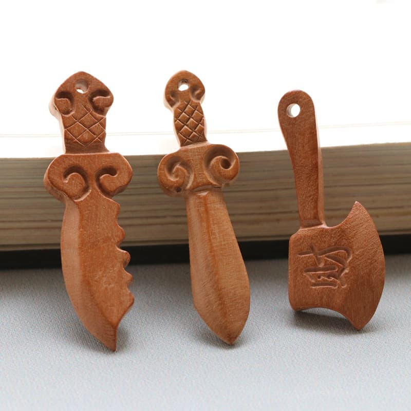 Peach wood knives, swords, axes, and accessories; peach wood carvings; peach wood swords; woven DIY accessories and pendants; factory wholesale.