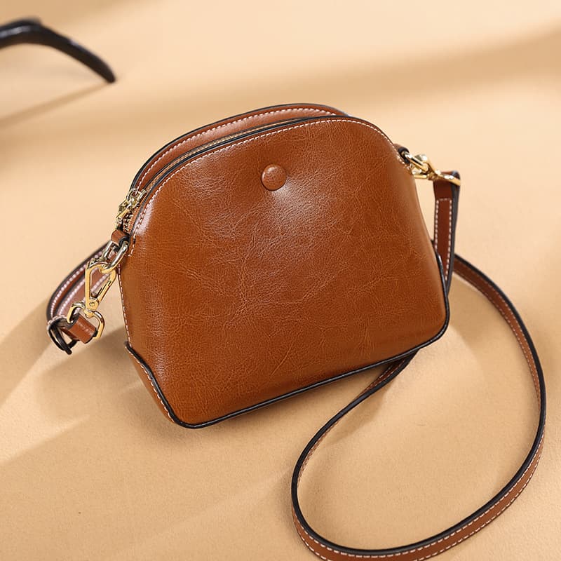 Hong Kong purchasing oil wax genuine leather women's bag niche bag 2025 new versatile cowhide shoulder bag diagonal shell bag trend