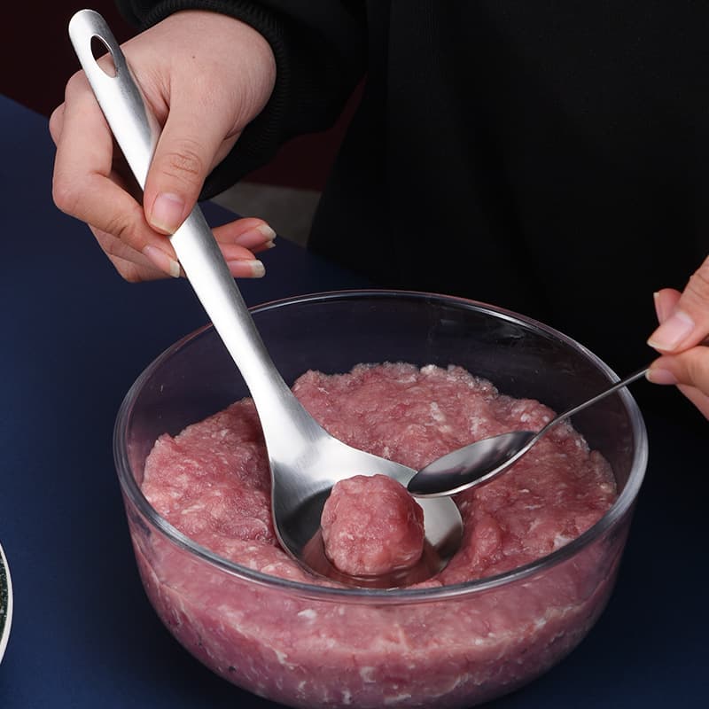 Stainless steel meatball spoon, manual meatball maker for home kitchens.