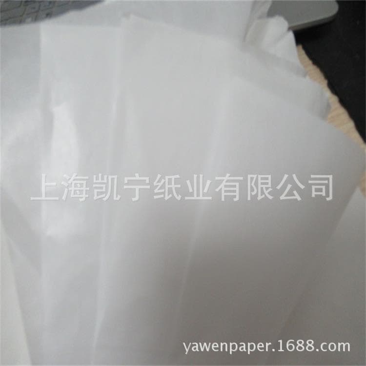 Supply of natural white, non-fluorescent, 38g/40g translucent, oleophobic, waxed greaseproof paper.