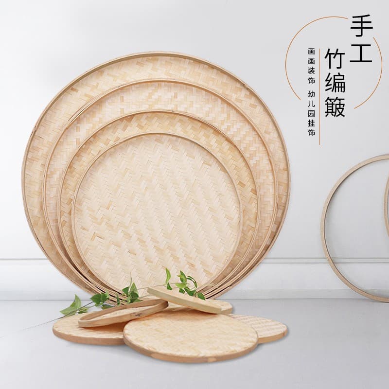 Wholesale shallow, holeless bamboo sieves, round winnowing baskets, bamboo trays, and plates for kindergarten crafts and decorative purposes.