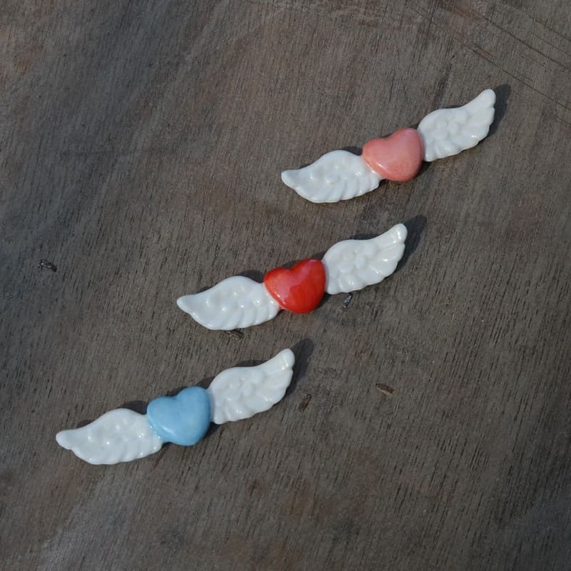 Love angel wings chopstick holder wholesale ceramic crafts chopstick holder chopstick drag MOE pink girl heart chopstick pillow