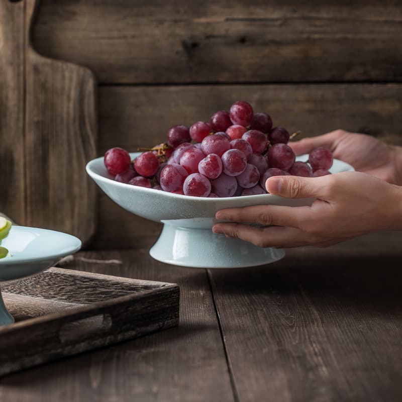 Japanese-style ceramic pedestal fruit bowl, irregular ceramic dried fruit bowl, Buddhist offering plate, hotel celadon tableware wholesale