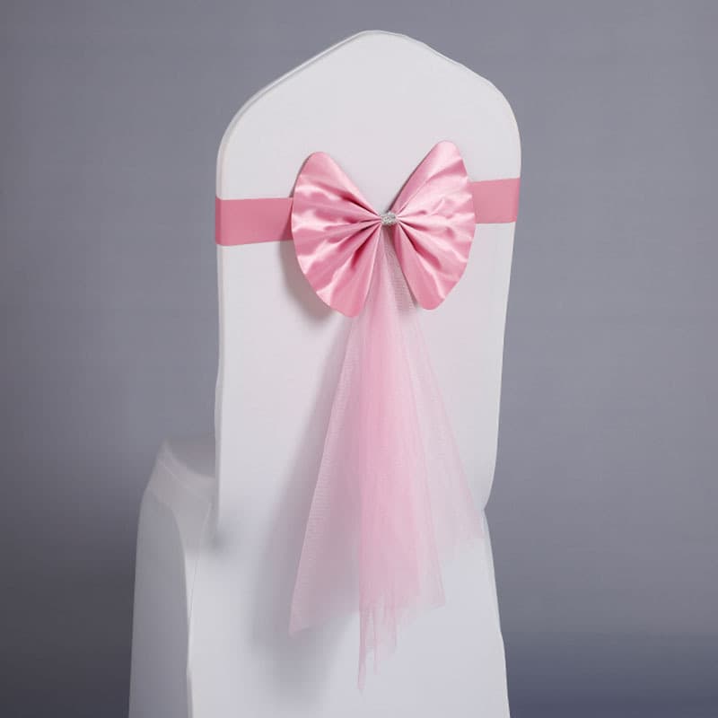 Hotel wedding chair back covers with elastic leather, floral chair covers, bow ties, and ribbons; wedding chair back decorations.