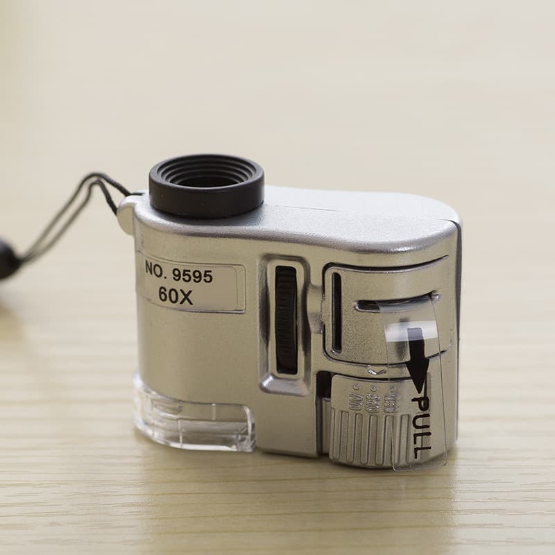 Factory direct mini microscope with light and counterfeit detection, 60x magnification, model 9595 includes leather case