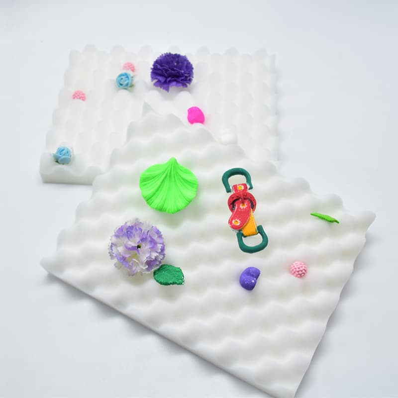 2 pieces of fondant flowers, drying and shaping wavy sponge mat, foam mat, baking tools