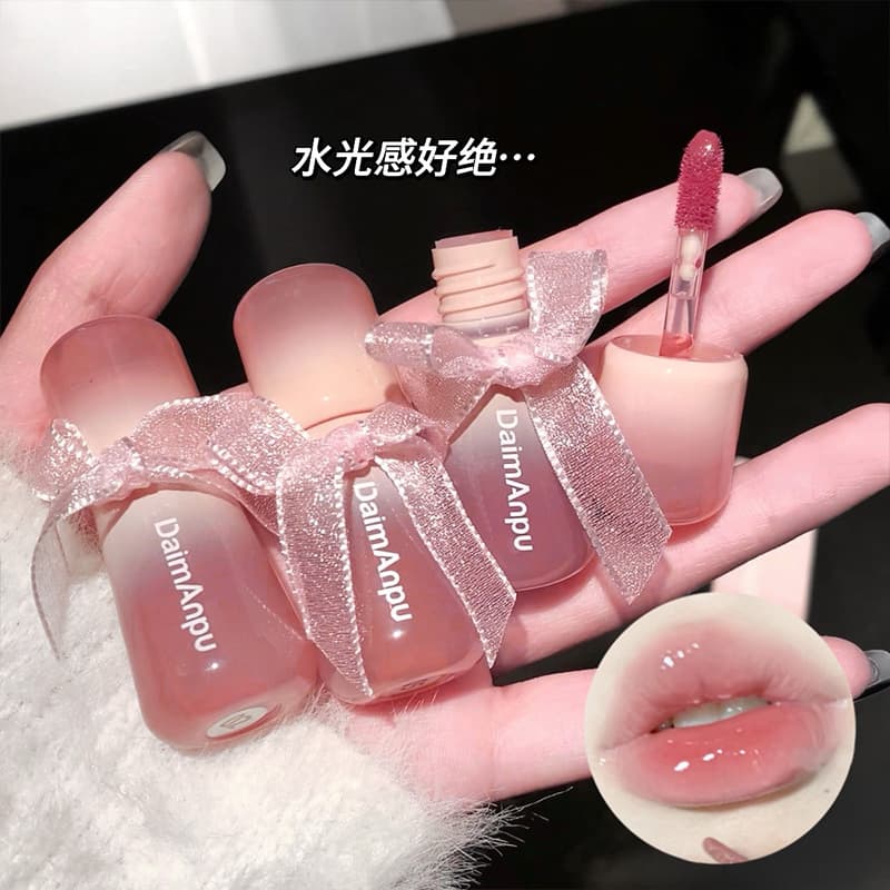DAIMANPU bow water-glossy mirror lip glaze non-stick cup does not fade pure desire hydrating lip gloss lip gloss