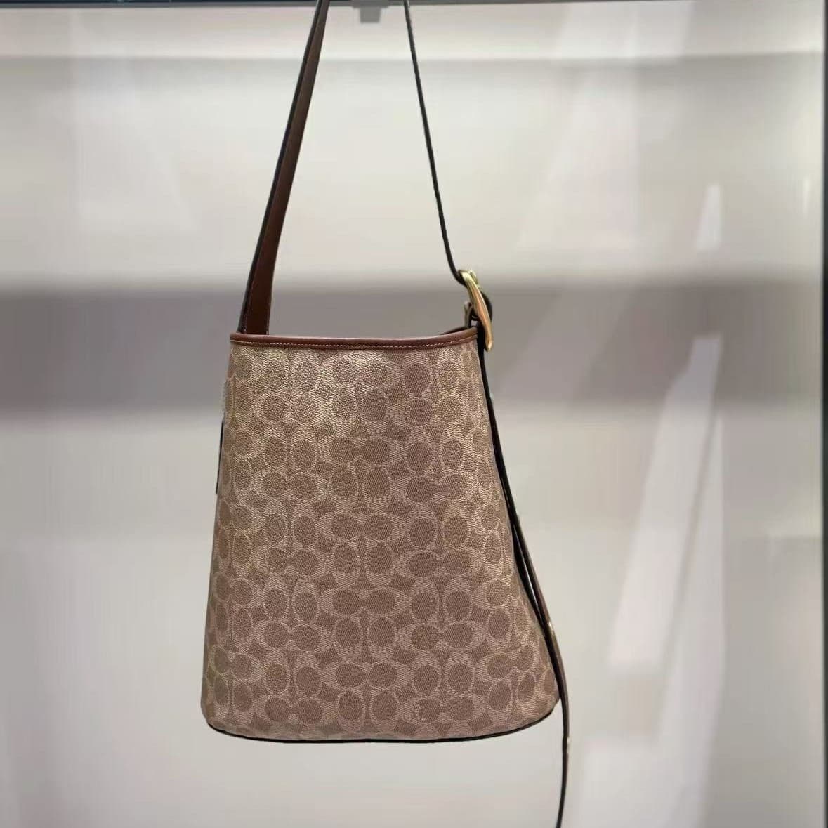 Coach co's new women's bag Jude Signatura bucket bag one-shoulder cross-body vegetable basket hand-held shopping bag