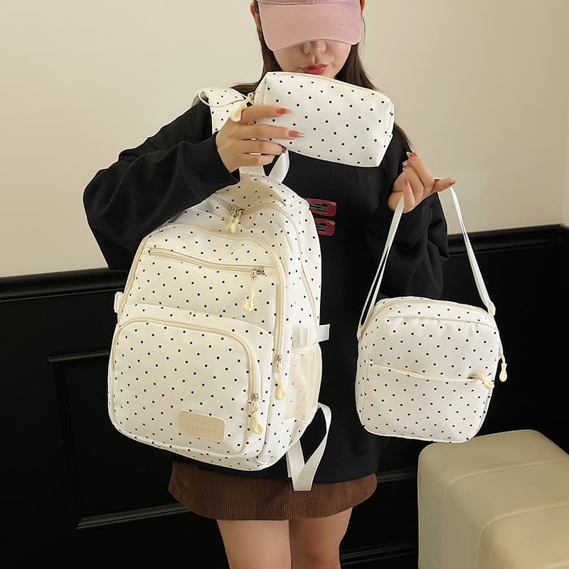 Spring new Korean style polka dot nylon schoolbag women's high-looking three-piece set niche backpack lightweight burden-reducing backpack