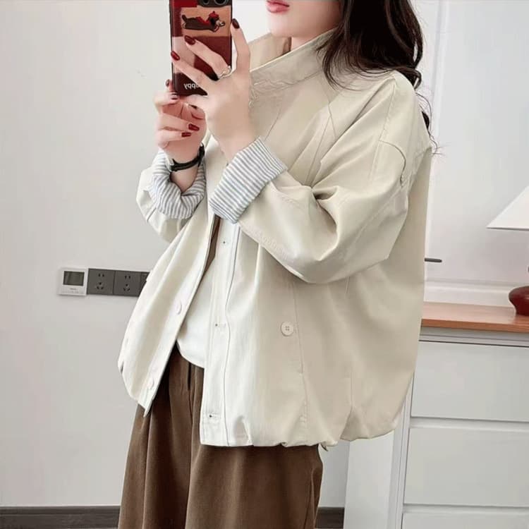 A dropshipping 2026 spring new style stand-up collar buttoned design solid color foreign style slimming and age-reducing short coat for women