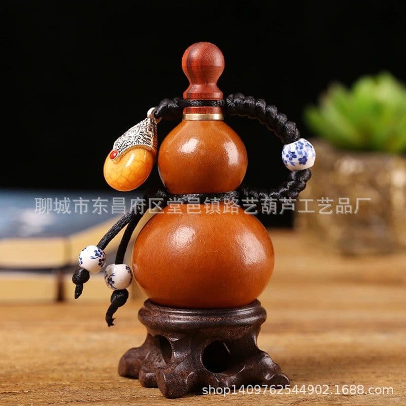 Factory direct sales of natural mini wine gourds, open gourds, antique patina beeswax waterproof wine gourd pendants wholesale.