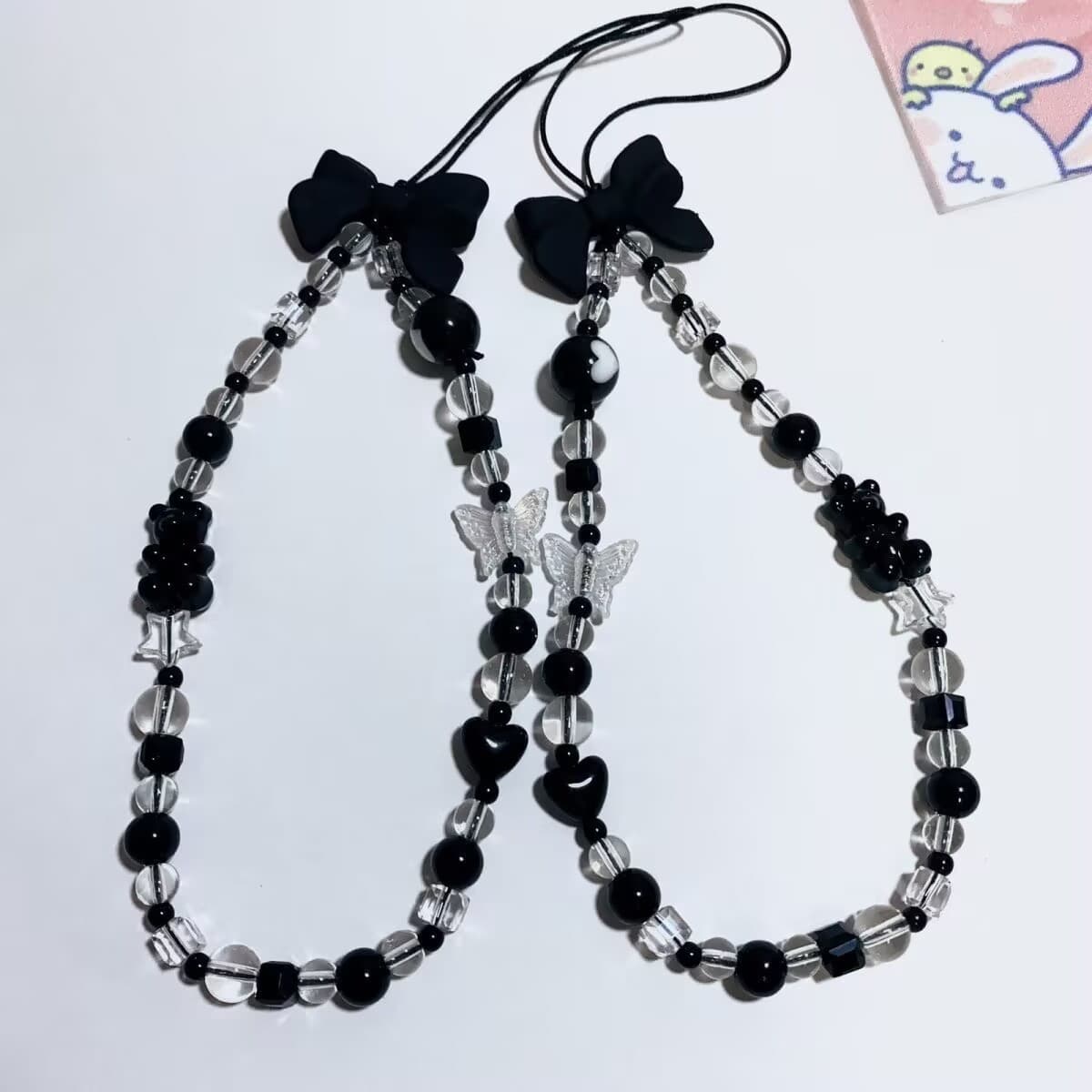 Korean ins style Internet celebrity black bear bow mobile phone hanging chain ccd lanyard versatile pendant accessories anti-lost
