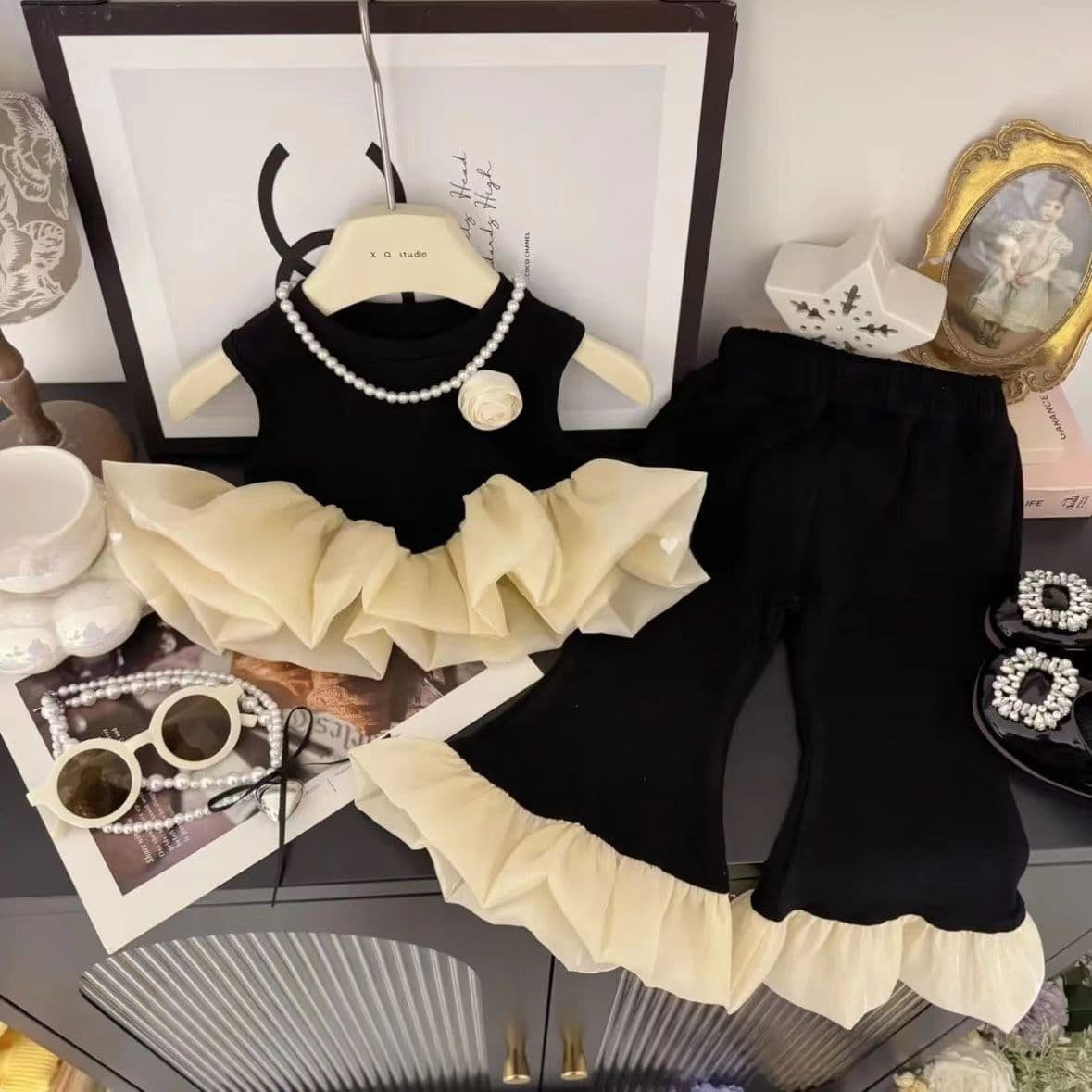 Girls summer new style 2025 baby girl Korean version black swan ruffled vest fungus edge boot pants two-piece set