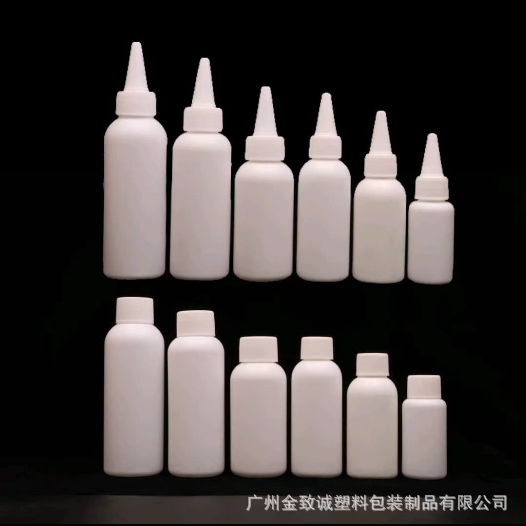 Round shoulder manufacturer bulk supply round shoulder white pointed nozzle bottle light-proof and shading 50ml toothpaste pointed nozzle bottle HDPE squeeze