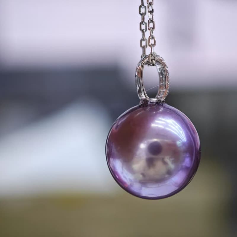 National Pride: 13-14MM Perfectly Round, Flawless Strong Light Natural Color Beads with Bulb-like Appearance
