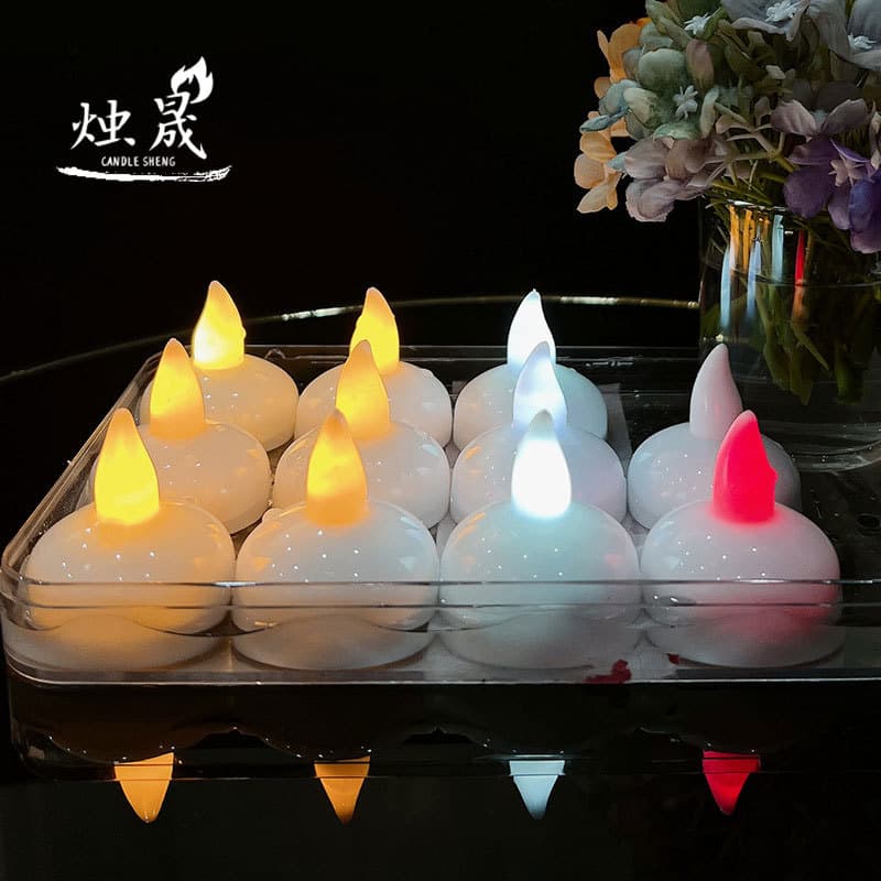 Cross-border Hot-Selling Floating Candle Lights Up on Contact with Water Water Decoration Amazon LED Waterproof Electronic Candle Lamp Prop