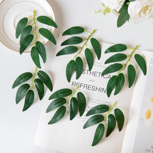 Artificial green leaves, schefflera, gardenia leaves, potted plants, decorative artificial flowers and leaves, flat dried branches, manufacturers wholesale.