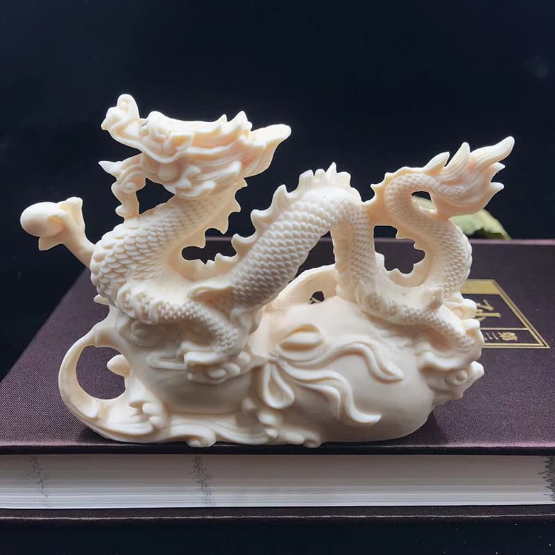 Ivory fruit carvings, Li dragons and pearls, dragons flying around the world, Chinese dragon crafts, gift boxes, factory direct sales