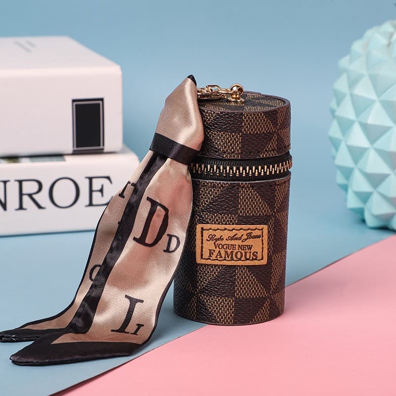European and American style geometric pattern key case for women, high appearance, exquisite storage, lipstick bag keychain, multifunctional round barrel