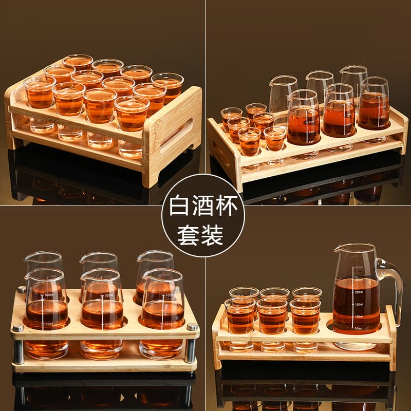 Baijiu (Chinese liquor) glass set, including bullet glass holder, small wine glasses, bamboo and wood stand, decanter, and glass wine jug.
