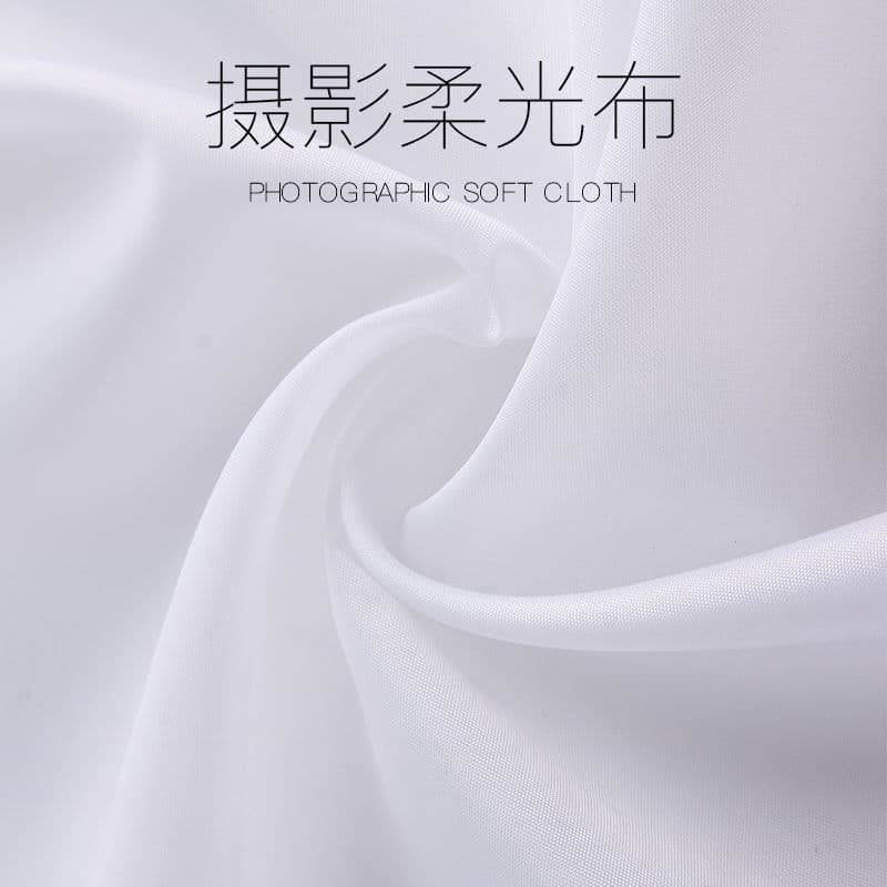Photography shoot using white soft light cloth, translucent background cloth, studio light-transmitting white cloth for posed shots.