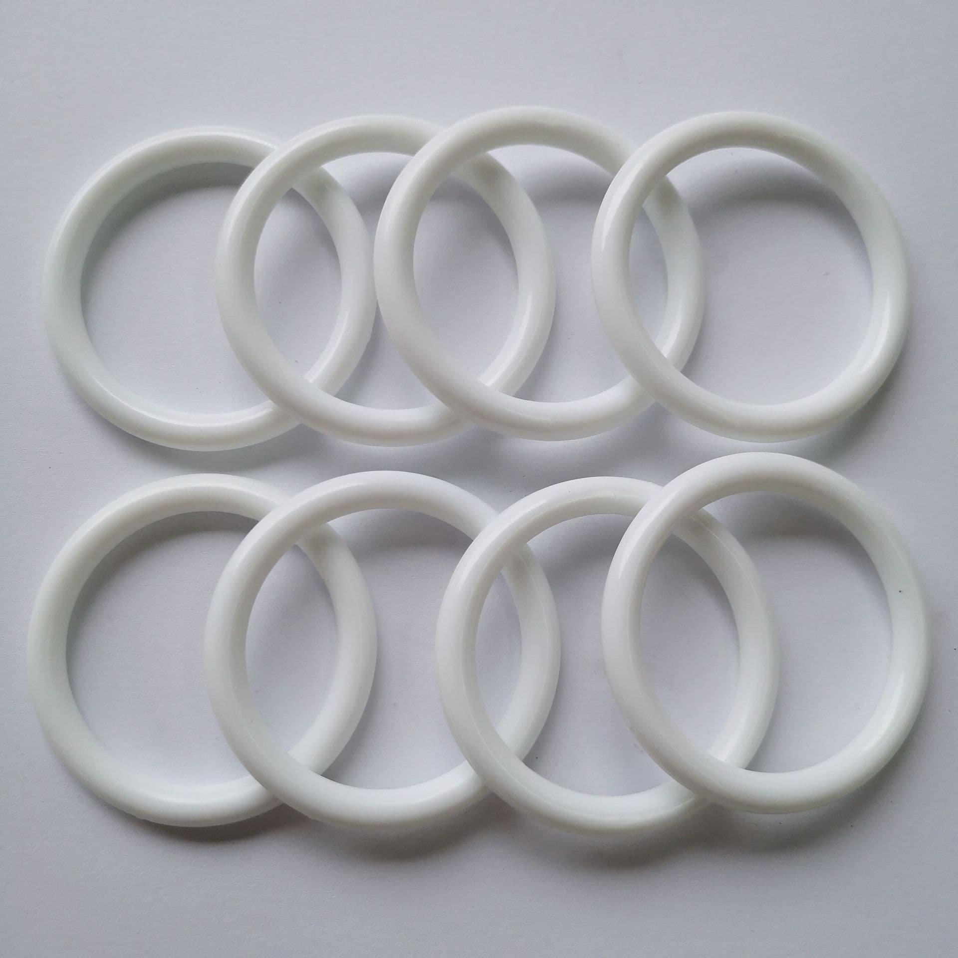 Factory direct supply of virgin plastic rings, bag handles, hinged plastic rings, plastic carrying handles, pull rings.