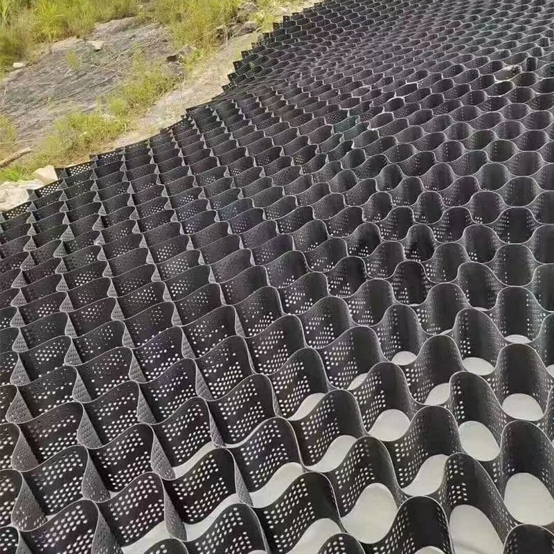 Honeycomb geogrid for slope protection, geocell with drainage holes, high-strength geogrid for greening and slope reinforcement.