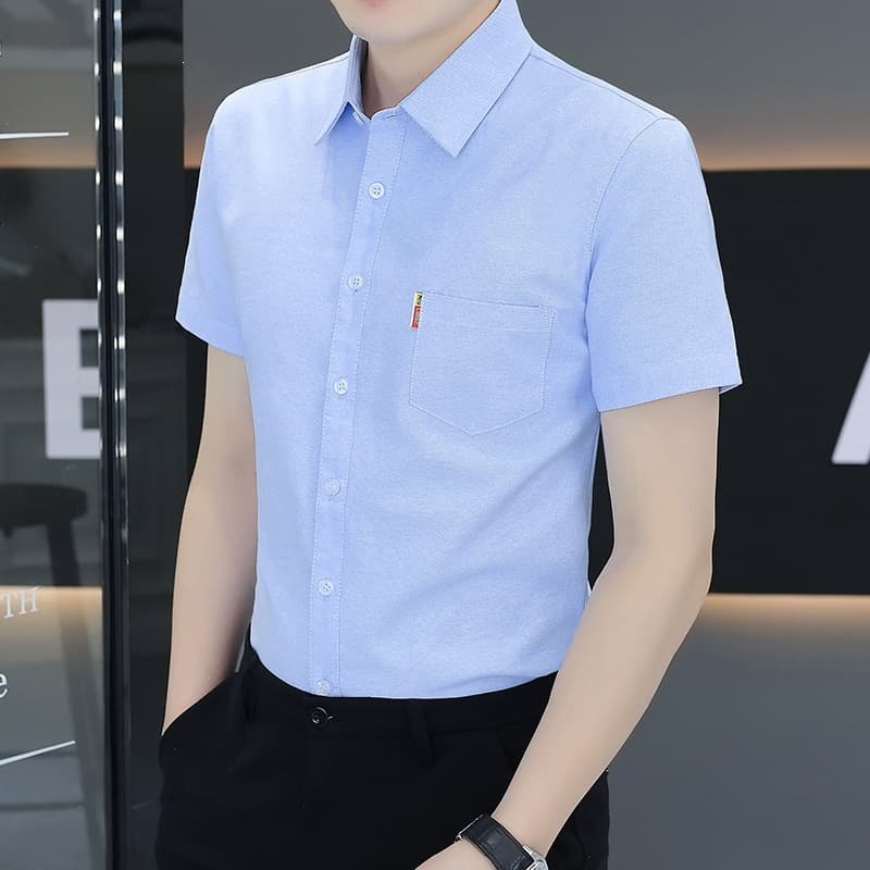 Guangzhou Oxford spinning summer men's short-sleeved shirt pocket solid color trendy men's casual shirt male M-4xl