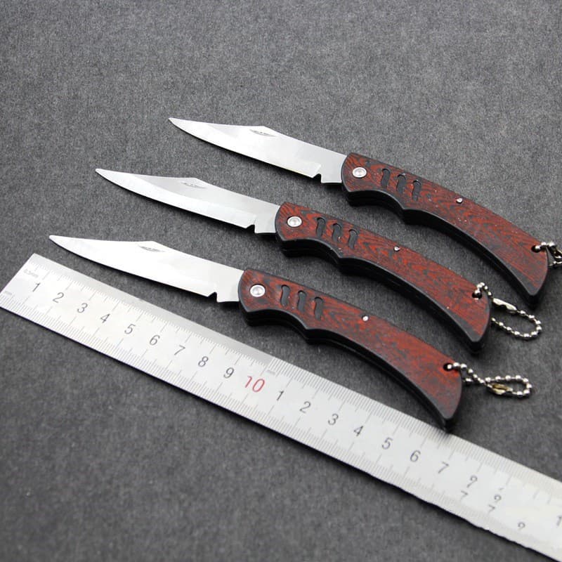 Two-dollar store wood grain fruit knife, household foldable knife, potato peeler, portable wooden handle knife wholesale