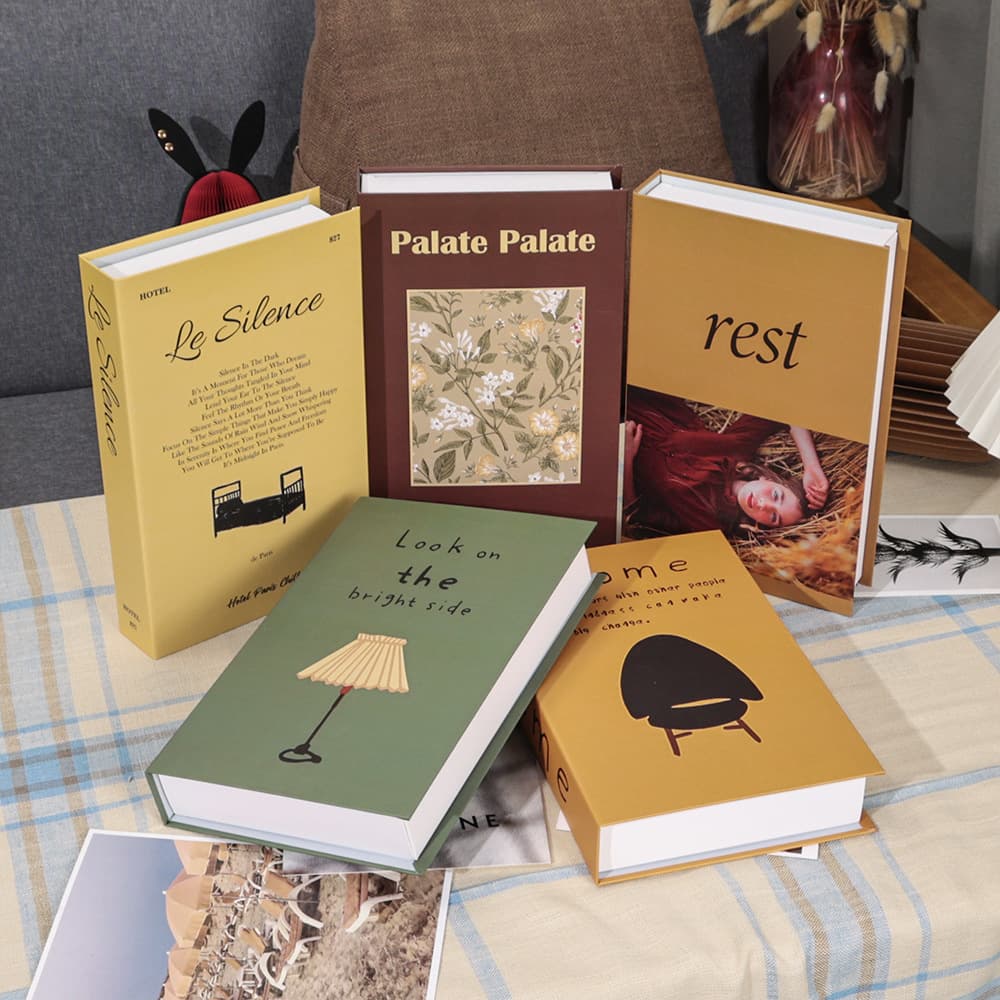 Korean bloggers on Instagram are using fake books as table decorations, props for interior design, photography, and home decor in guesthouses and studios.