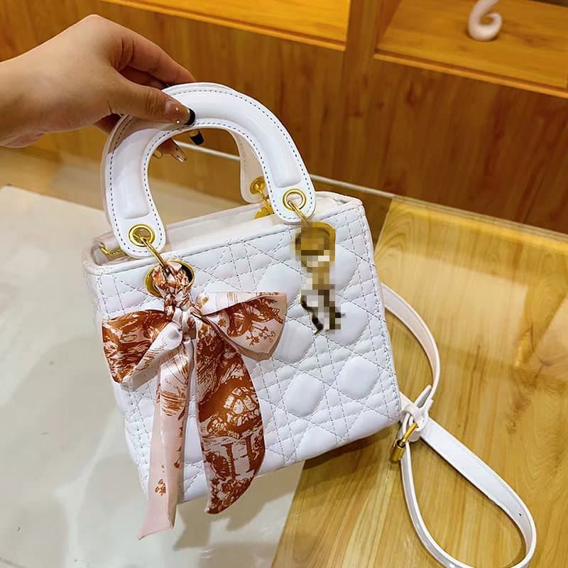 Cross-border 2026 women's new fashion and versatile Princess Diana bag rhombus embroidery portable diagonal multi-function bag