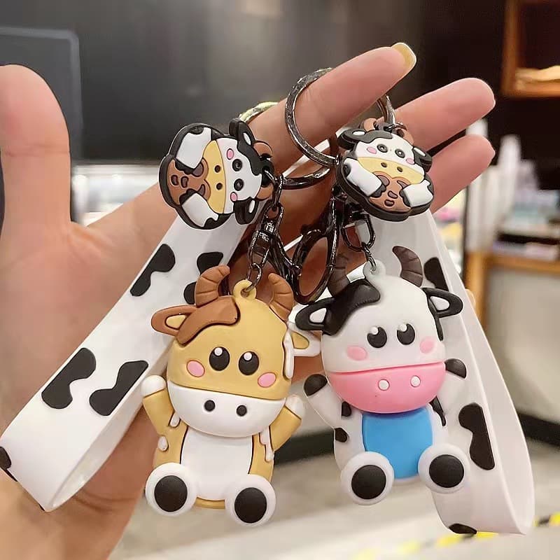 New cow key chain creative cartoon doll cow car key chain couple bag pendant key pendant