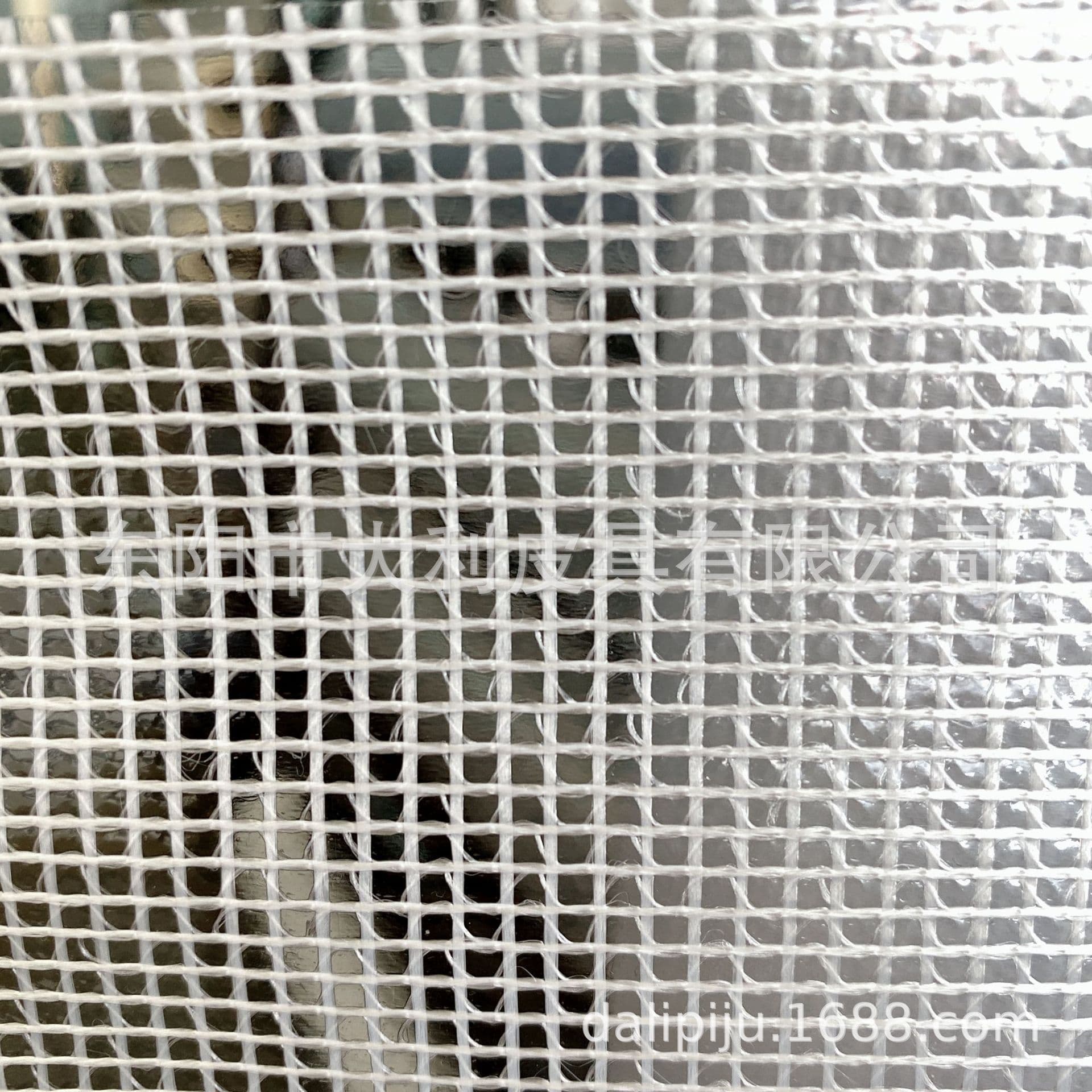 Yiwu offers spot supply of PVC mesh fabric, transparent PVC mesh, 23-micron thickness, waterproof and wear-resistant storage and bag material.