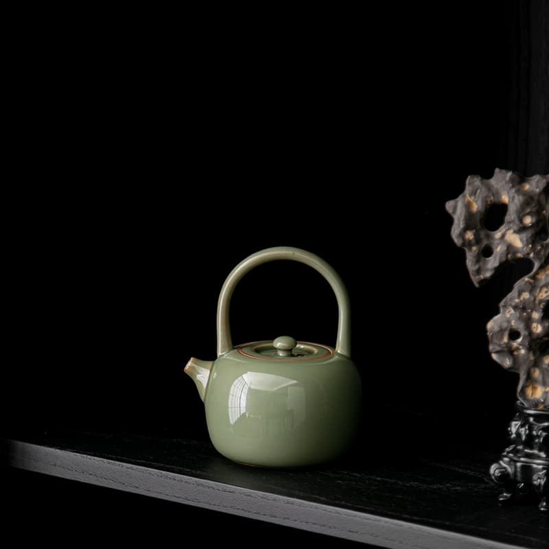 Celadon Lifting Handle Teapot Household Ceramic Teapot with Filter for Brewing Tea Kung Fu Tea Set Single Pot Candle Warming Teapot Wholesale