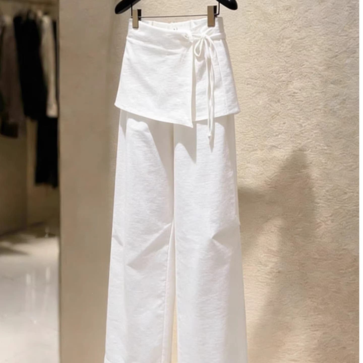 Cross-border European products slimming wide-leg pants for women 2026 summer new style loose splicing lazy style white butt curtain design