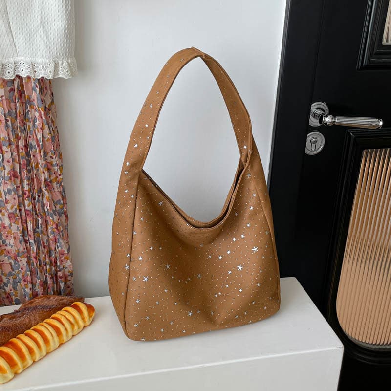 2026 Korean new style fashionable and shiny shoulder tote bag for women commuting large capacity armpit bag wholesale