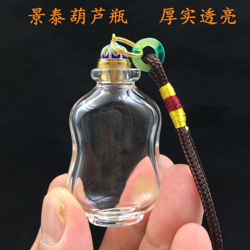 Transparent snuff bottle gourd-shaped container for gold beans, glass storage jar with screw top for organization and preservation.