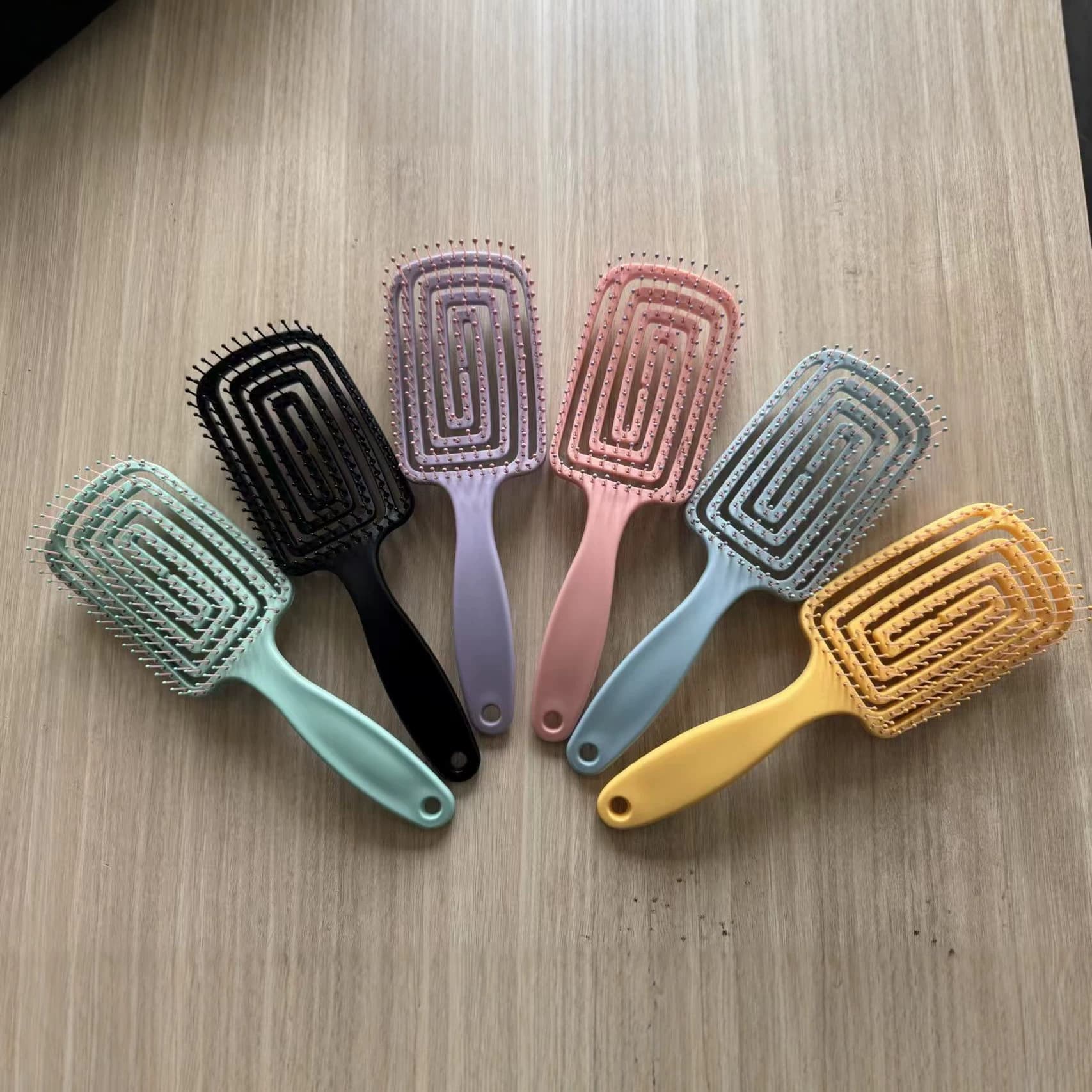 Manufacturer's fluffy high skull comb hair artifact women's special long hair styling massage household hollow rib comb
